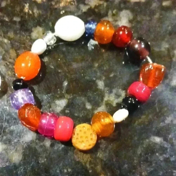 A set of four elastic beaded bracelets..perfect for anyone..size S in Adults - Picture 3 of 5